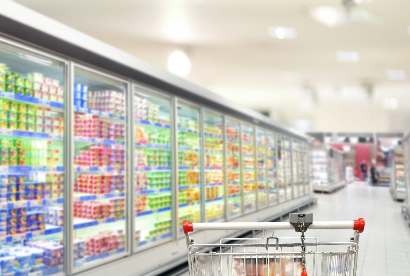 Supermarket aisle with frozen food