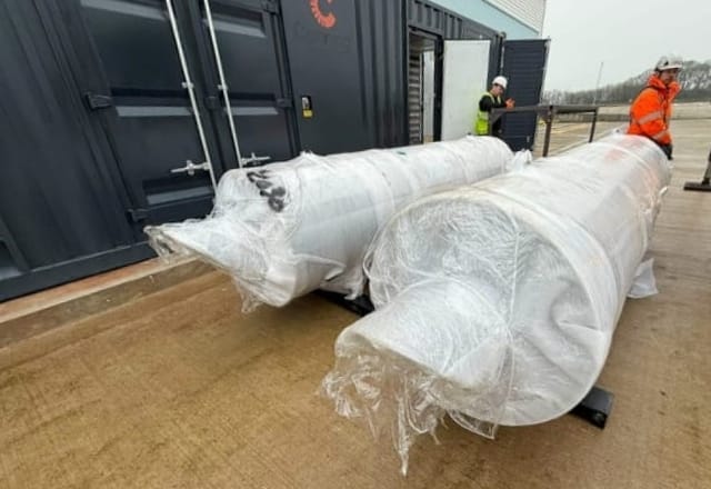 Wrapped cylindrical objects on a platform